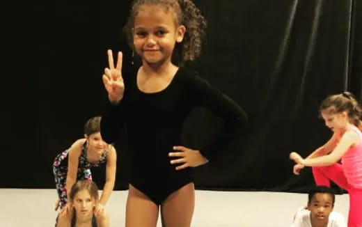 a woman in a black dress