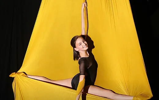 a woman in a yellow dress