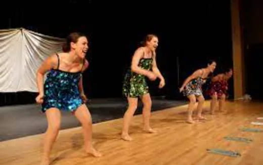 a group of women dancing