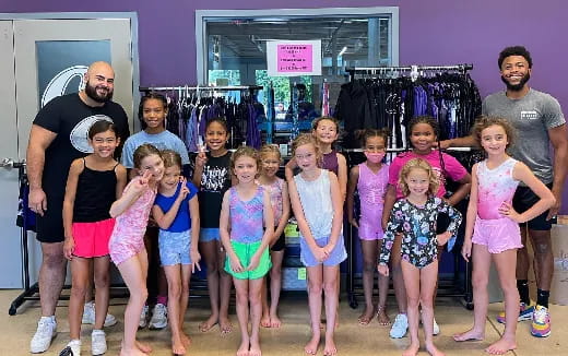 a group of people posing for a photo