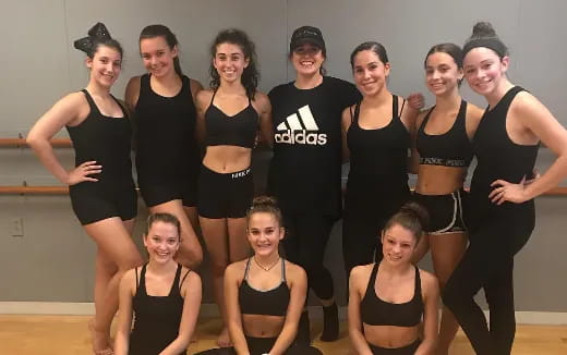 a group of people posing for a photo