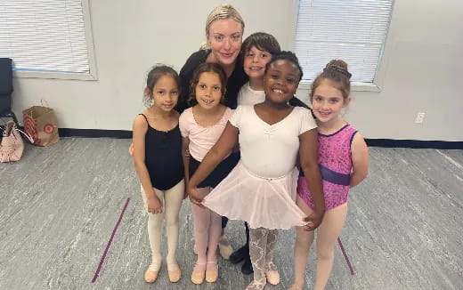 a group of girls posing for a photo