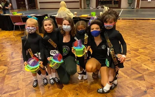 a group of girls wearing clothing