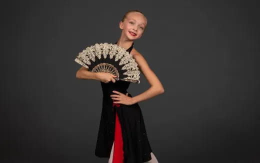 a boy wearing a garment