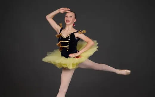 a woman dancing on a stage