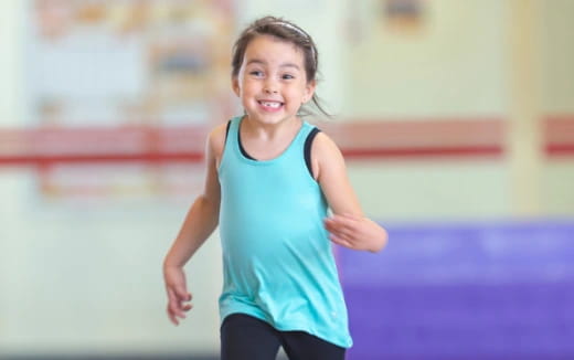 a woman in a blue tank top