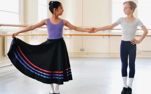 a couple of women dancing