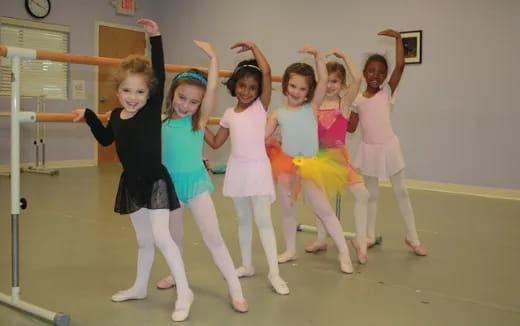a group of girls posing for a picture
