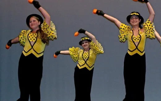 a group of women wearing clothing