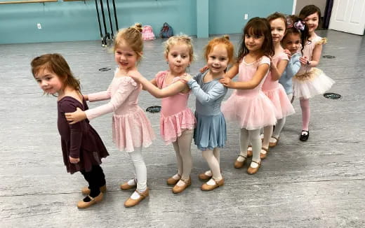 a group of children dancing