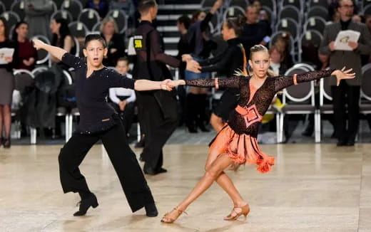 a man and woman dancing