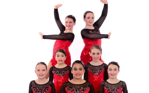 a group of people posing for the camera