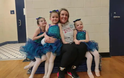 a group of girls sitting on a couch