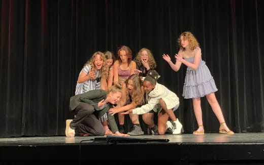 a group of people on a stage