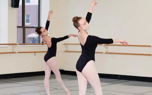 a couple of women dancing
