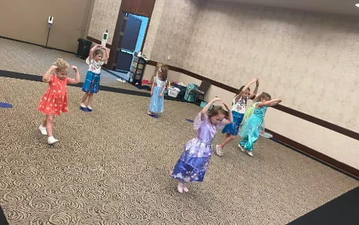 a group of children dancing