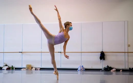 a woman doing gymnastics