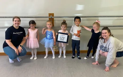 a group of people posing for a photo