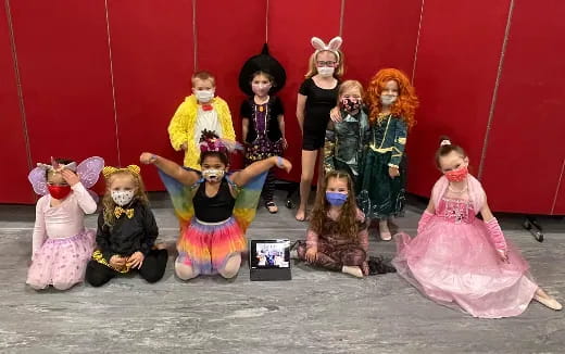 a group of children in clothing