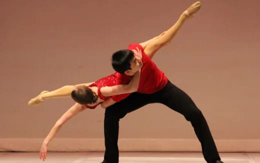 a man and woman dancing