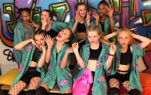 a group of children posing for a photo