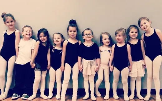 a group of women posing for a photo