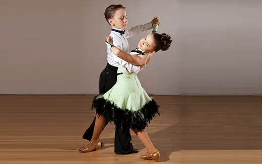 a man and woman dancing