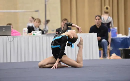 a person in a wrestling uniform