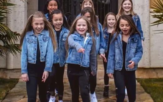 a group of people posing for a photo