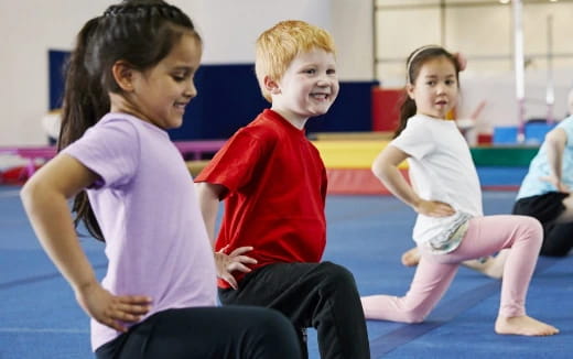 a group of children sitting on the floor