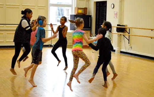 a group of children dancing