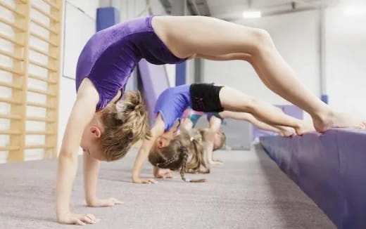 a few people doing yoga