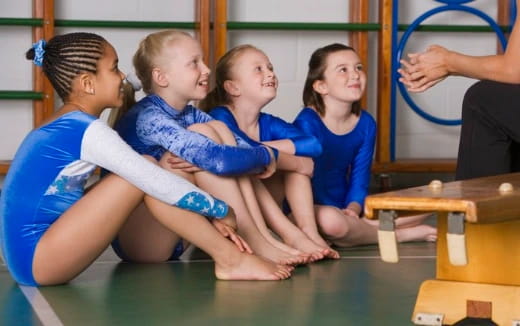 a group of women in blue uniforms