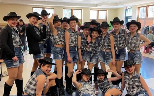 a group of people wearing hats