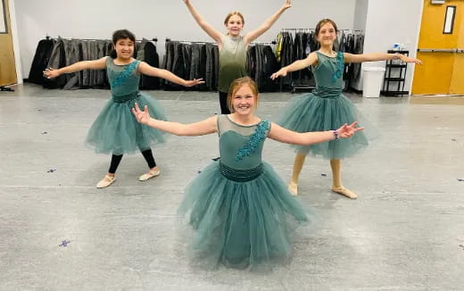 a group of girls dancing