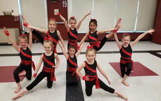 a group of girls in a gym