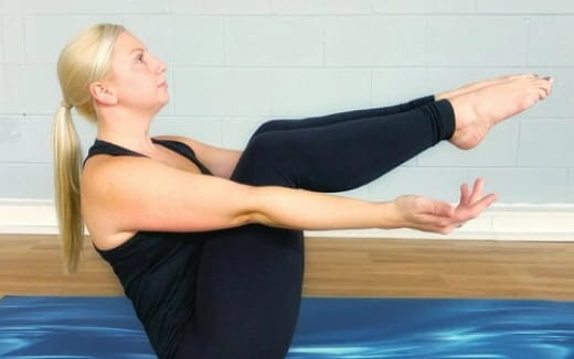 a woman doing yoga