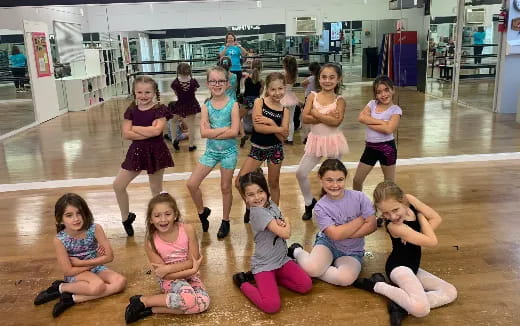 a group of children posing for a photo