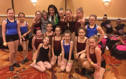 a group of people posing for a photo