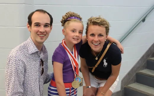 a group of people posing for the camera