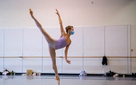 a woman doing a gymnastics trick