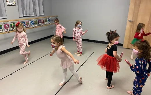 a group of children dancing