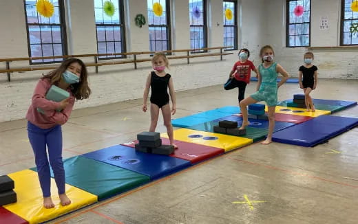 children playing on a mat