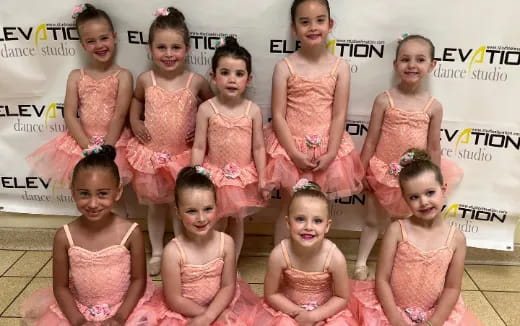 a group of girls posing for a photo