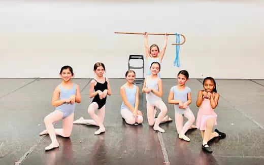 a group of women posing for a photo