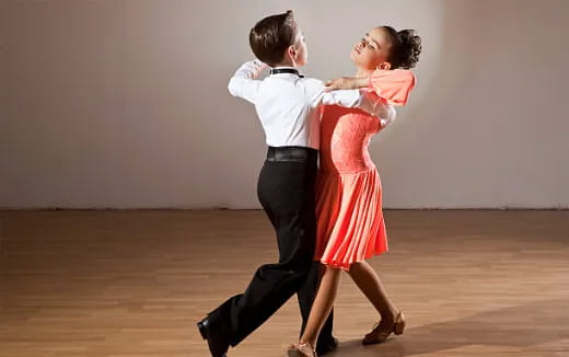 a man and woman dancing