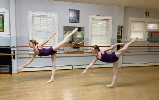 a couple of women dancing