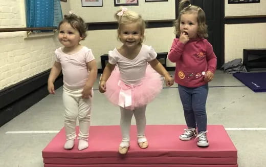 a group of girls in a room