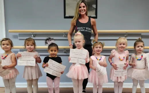 a group of children holding signs
