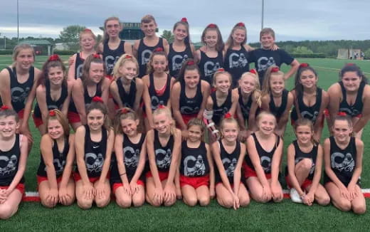 a group of people posing for a photo